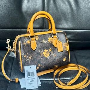 NWT Coach Mini Rowan Crossbody Bag Signature Canvas Floral CCF31 Walnut/Yellow